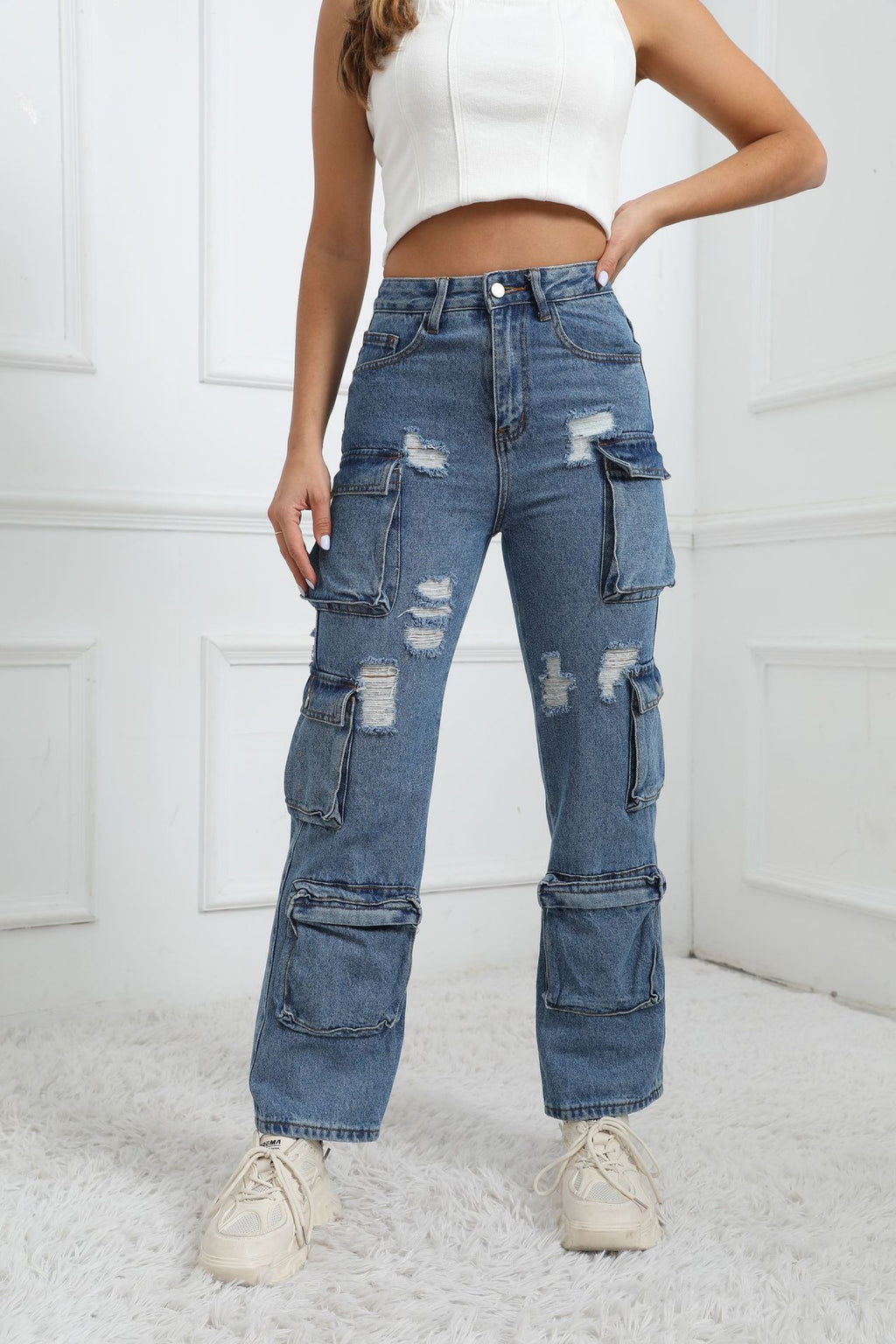 Ripped jeans with pockets-D560
